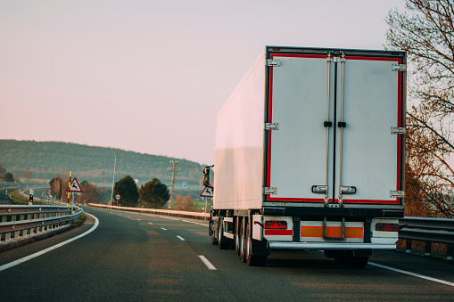 Truck on a highway at sunset in Spain